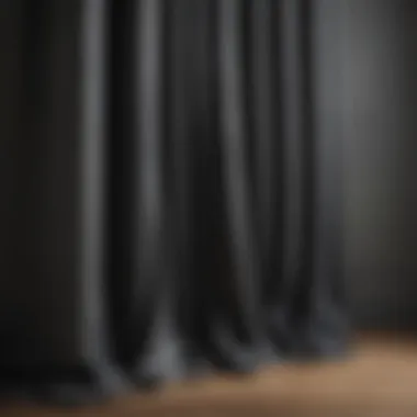 Textured Fabric of Dark Gray Curtains Close-up of textured fabric used in dark gray kitchen curtains.