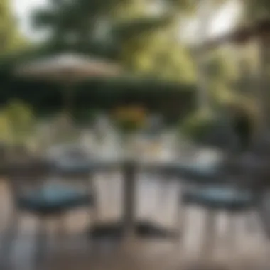 Sophisticated Outdoor Dining Experience Elegant outdoor setting featuring a large round glass patio table surrounded by comfortable chairs